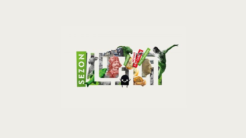 Grafika złożona z napisu Lublin, w który wkomponowane są postacie i elementy architektury, symboli związanych z miastem.